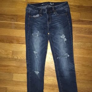 American Eagles Dark Wash Stretch Jeggings w/ Rips
